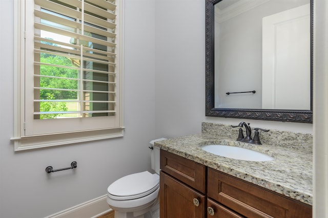 1020 Fairway Ridge Cir, Greensboro, GA 30642 - half bathroom featuring vanity, ornamental molding, and toilet