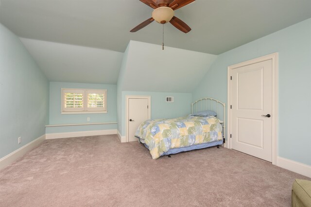 1020 Fairway Ridge Cir, Greensboro, GA 30642 - carpeted bedroom with lofted ceiling, baseboards, and a ceiling fan