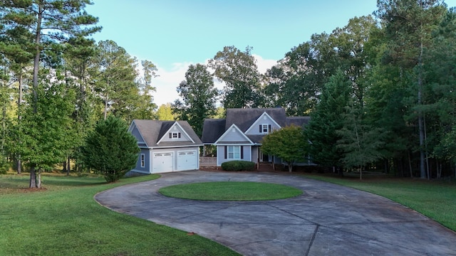 view of front facade featuring a garage and a front yard