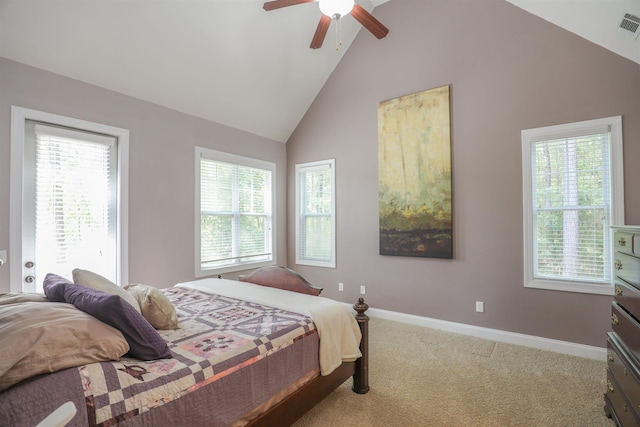 carpeted bedroom featuring ceiling fan and high vaulted ceiling