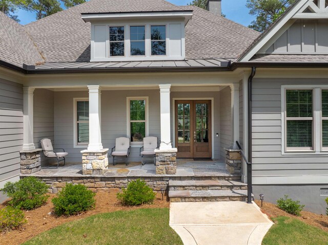 property entrance featuring a porch