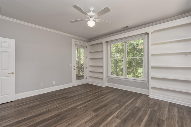 1051 Liberty Bluff Rd, Greensboro, GA 30642 - spare room with crown molding, baseboards, dark wood-type flooring, a ceiling fan, and plenty of natural light