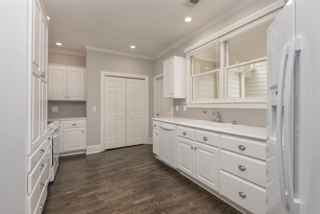 1051 Liberty Bluff Rd, Greensboro, GA 30642 - kitchen with white appliances, a sink, white cabinetry, backsplash, and light countertops