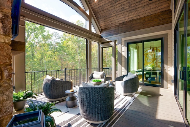 sunroom / solarium with vaulted ceiling