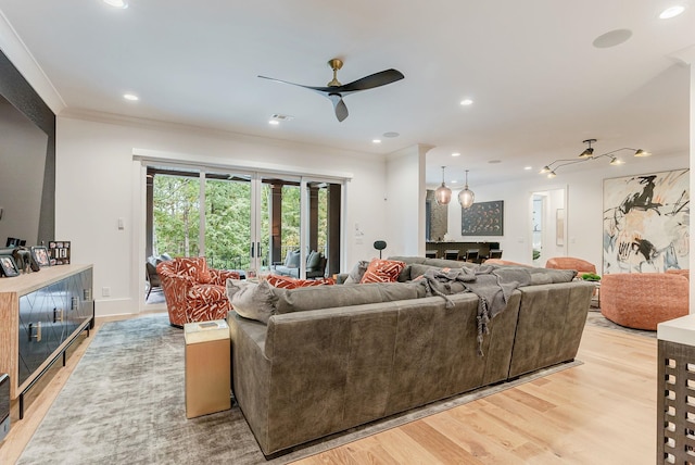 living room with french doors, ceiling fan, ornamental molding, and light hardwood / wood-style floors