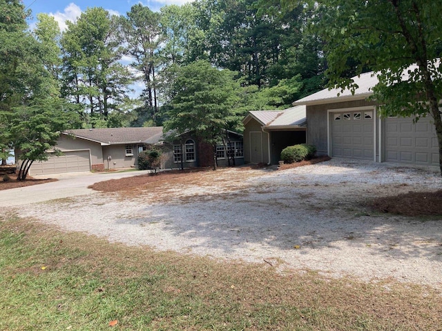 single story home with a garage