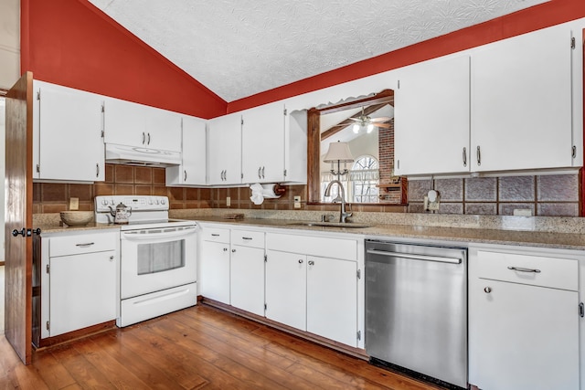 kitchen featuring sink, electric range, white cabinets, vaulted ceiling, and stainless steel dishwasher