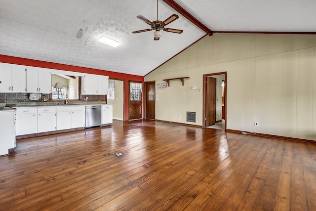 unfurnished living room with dark wood-type flooring, sink, high vaulted ceiling, ceiling fan, and beam ceiling