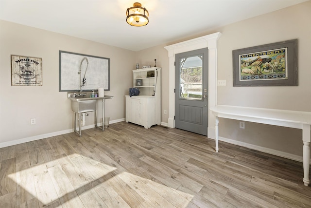 4410 Lower Apalachee Rd, Madison, GA 30650 - foyer entrance with baseboards and wood finished floors