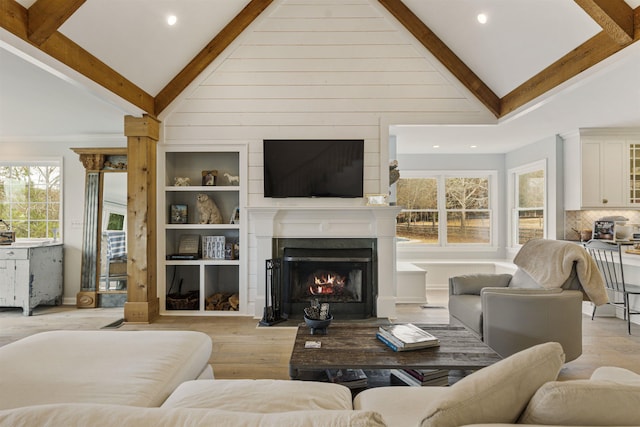 4410 Lower Apalachee Rd, Madison, GA 30650 - living area featuring recessed lighting, light wood finished floors, a fireplace with flush hearth, high vaulted ceiling, and beamed ceiling