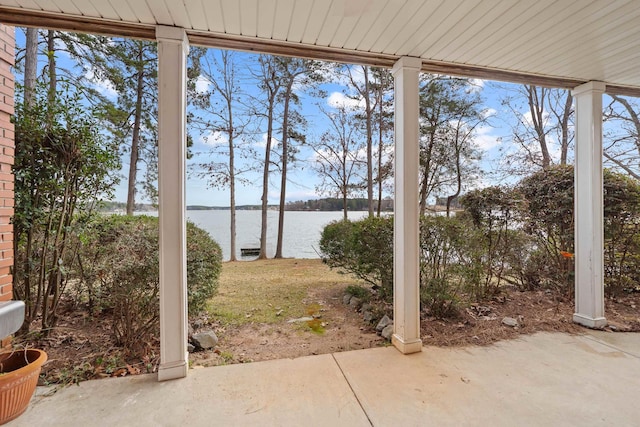 view of patio / terrace with a water view