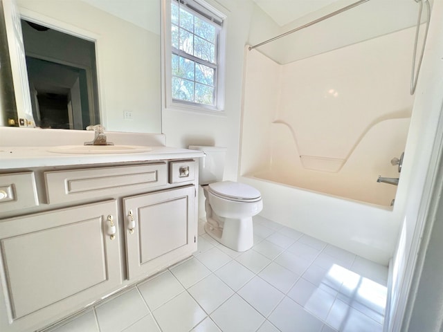 full bathroom with tile patterned flooring, vanity, bathtub / shower combination, and toilet