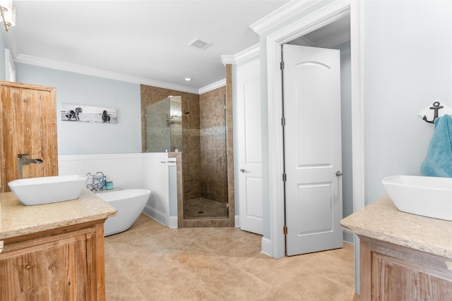 bathroom with visible vents, a stall shower, vanity, and ornamental molding