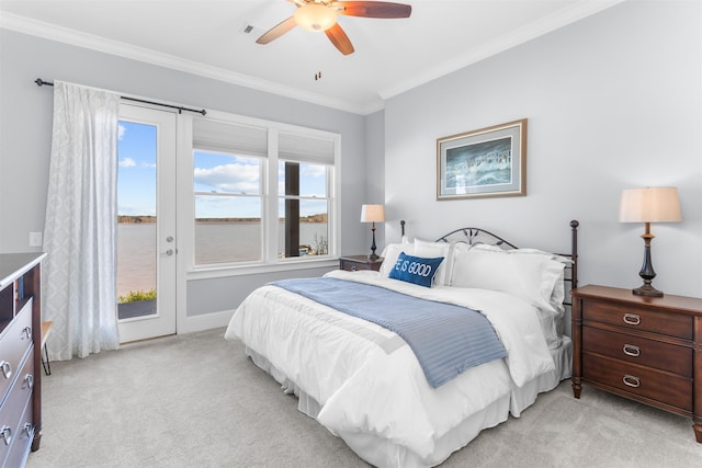 bedroom with visible vents, ornamental molding, a ceiling fan, light colored carpet, and access to exterior