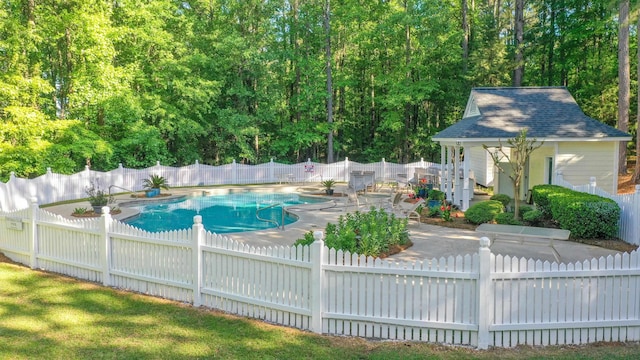 view of swimming pool with a fenced in pool, a fenced backyard, and a patio area