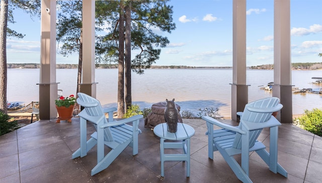 view of patio / terrace featuring a water view