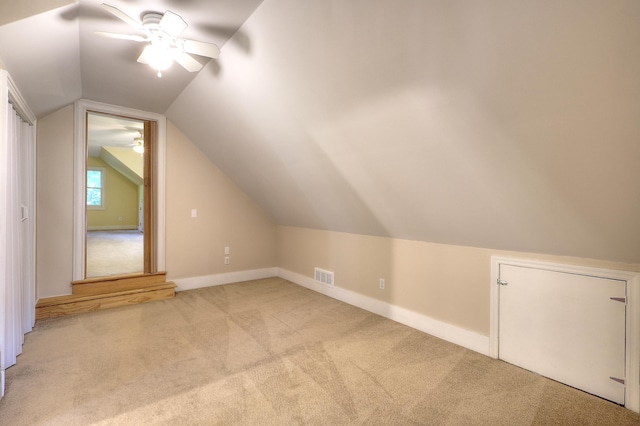243 Riverbend Dr, Eatonton, GA 31024 - bonus room with light colored carpet, a ceiling fan, and vaulted ceiling