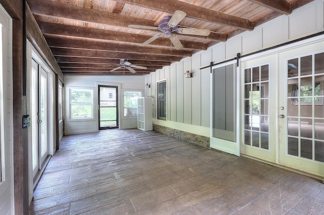 243 Riverbend Dr, Eatonton, GA 31024 - unfurnished sunroom featuring french doors, beam ceiling, and a barn door