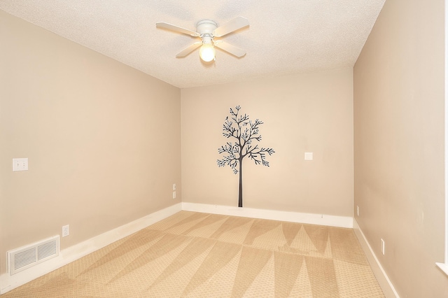 243 Riverbend Dr, Eatonton, GA 31024 - carpeted empty room featuring a textured ceiling and a ceiling fan