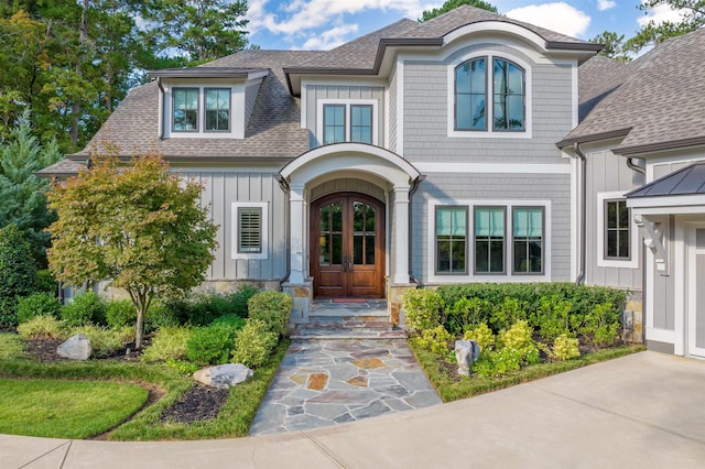 property entrance featuring french doors