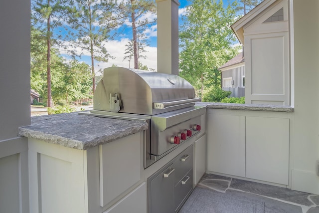 view of patio with grilling area and exterior kitchen