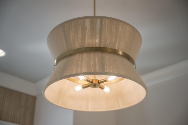 interior details featuring ceiling fan