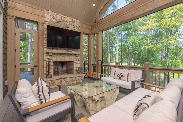 exterior space featuring an outdoor living space with a fireplace