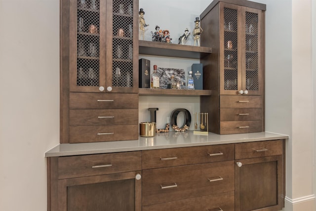 bar with dark brown cabinets