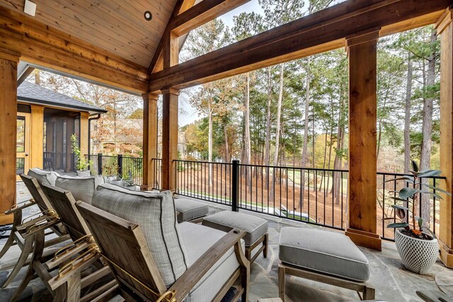 sunroom / solarium with lofted ceiling