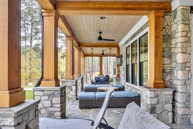 view of patio / terrace featuring covered porch and ceiling fan