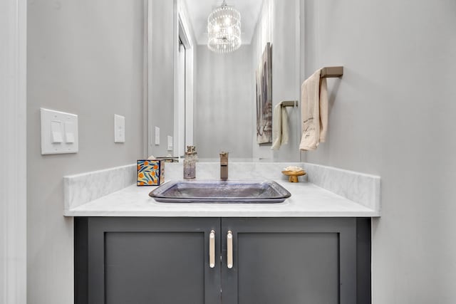 1191 Sugar Run, Greensboro, GA 30642 - bathroom featuring a chandelier and vanity