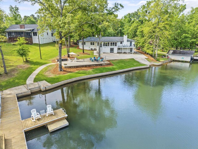 307 Lakeview Dr, Milledgeville, GA 31061 - dock area featuring a patio area, a yard, and a deck with water view