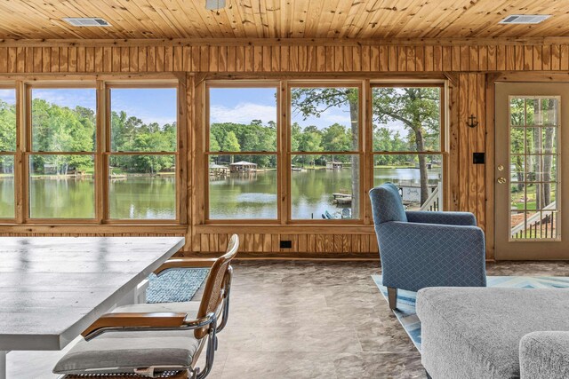 307 Lakeview Dr, Milledgeville, GA 31061 - sunroom / solarium featuring wooden walls, a water view, wooden ceiling, and view of wooded area