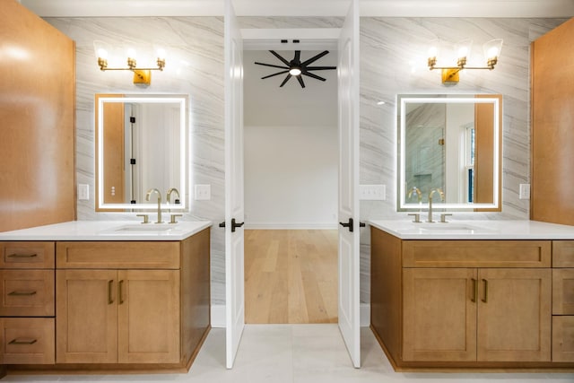 1050 Carnoustie Dr, Greensboro, GA 30642 - bathroom featuring two vanities and a shower
