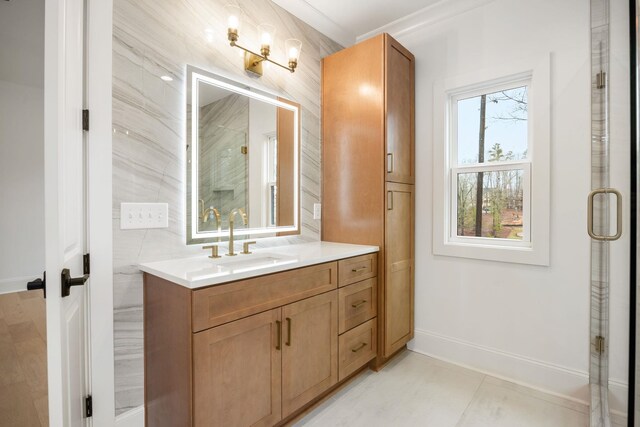 1050 Carnoustie Dr, Greensboro, GA 30642 - bathroom with vanity, a stall shower, baseboards, and a chandelier