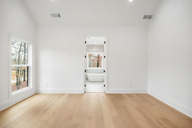 1050 Carnoustie Dr, Greensboro, GA 30642 - unfurnished room featuring light wood-style floors, baseboards, and recessed lighting