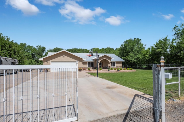 ranch-style house with a front lawn and a garage