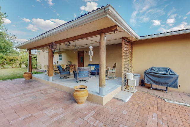 view of patio with a grill and an outdoor hangout area