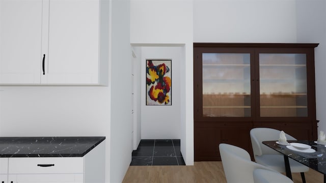 dining area with dark hardwood / wood-style flooring