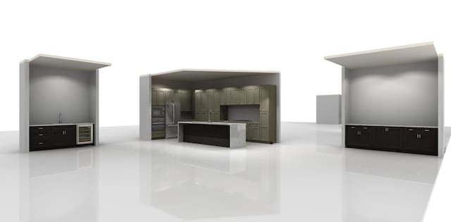 kitchen featuring a center island, sink, stainless steel fridge, and beverage cooler