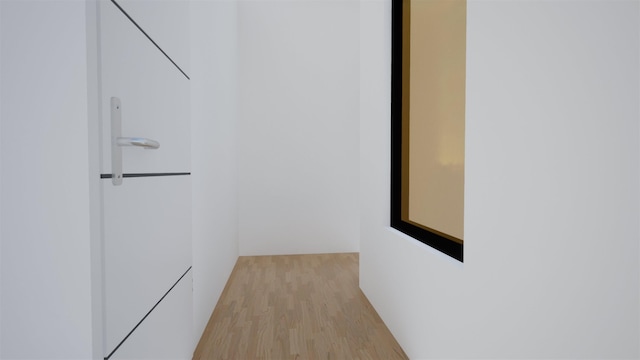 hallway featuring light wood-type flooring