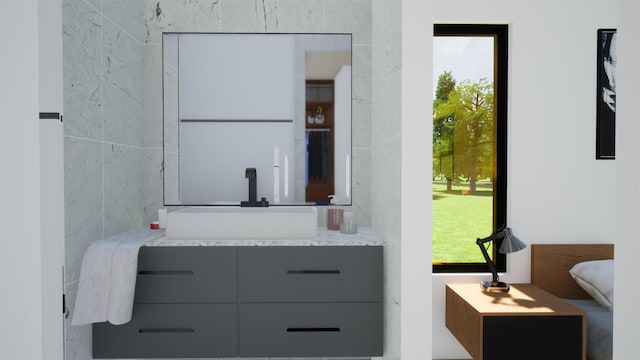 bathroom featuring vanity and plenty of natural light