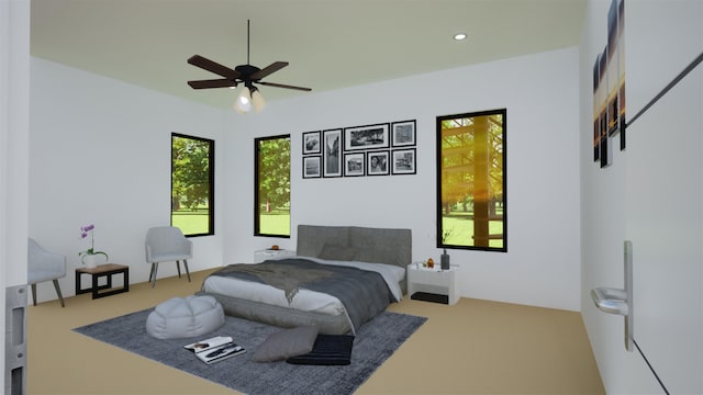 carpeted bedroom with ceiling fan