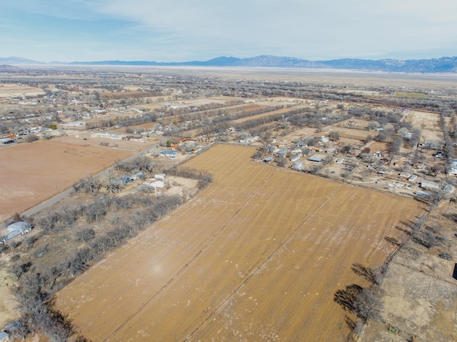 drone / aerial view featuring a mountain view