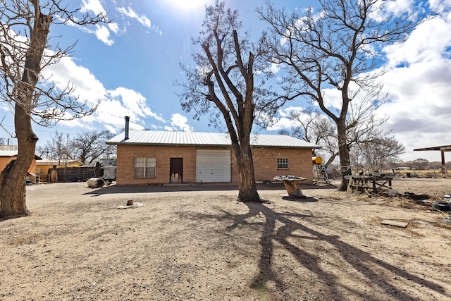 back of property featuring a patio