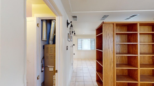 hallway with light tile flooring