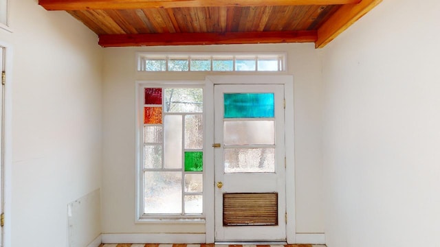 entryway with beamed ceiling and wooden ceiling