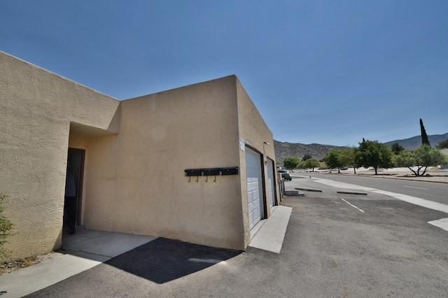 view of side of property featuring a mountain view