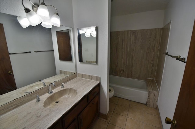 bathroom featuring tile patterned flooring, vanity, and toilet