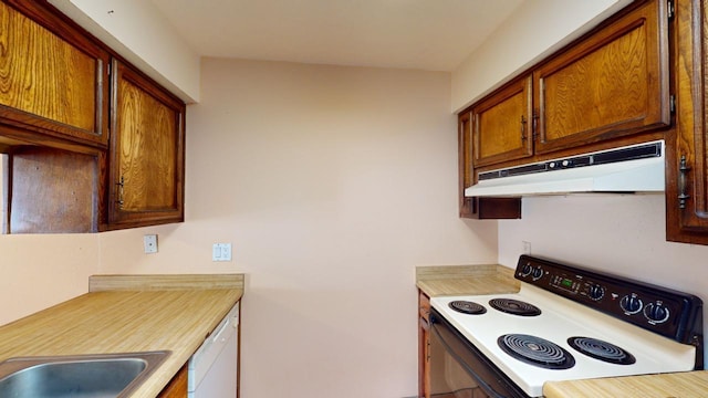 kitchen with sink and white appliances